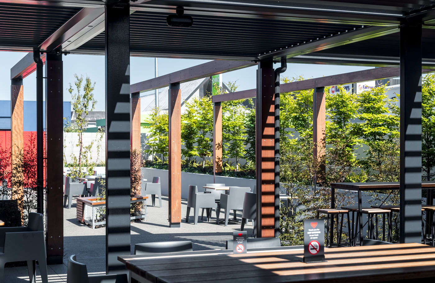 The outdoor courtyard with covered louvred pergola
