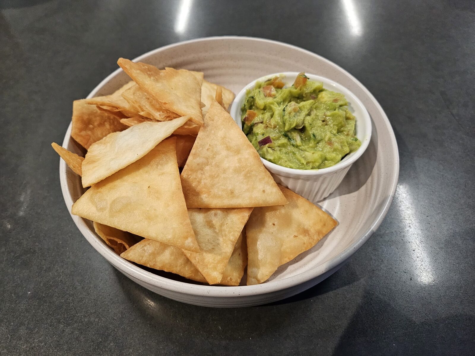 Tortilla crisps with guacamole