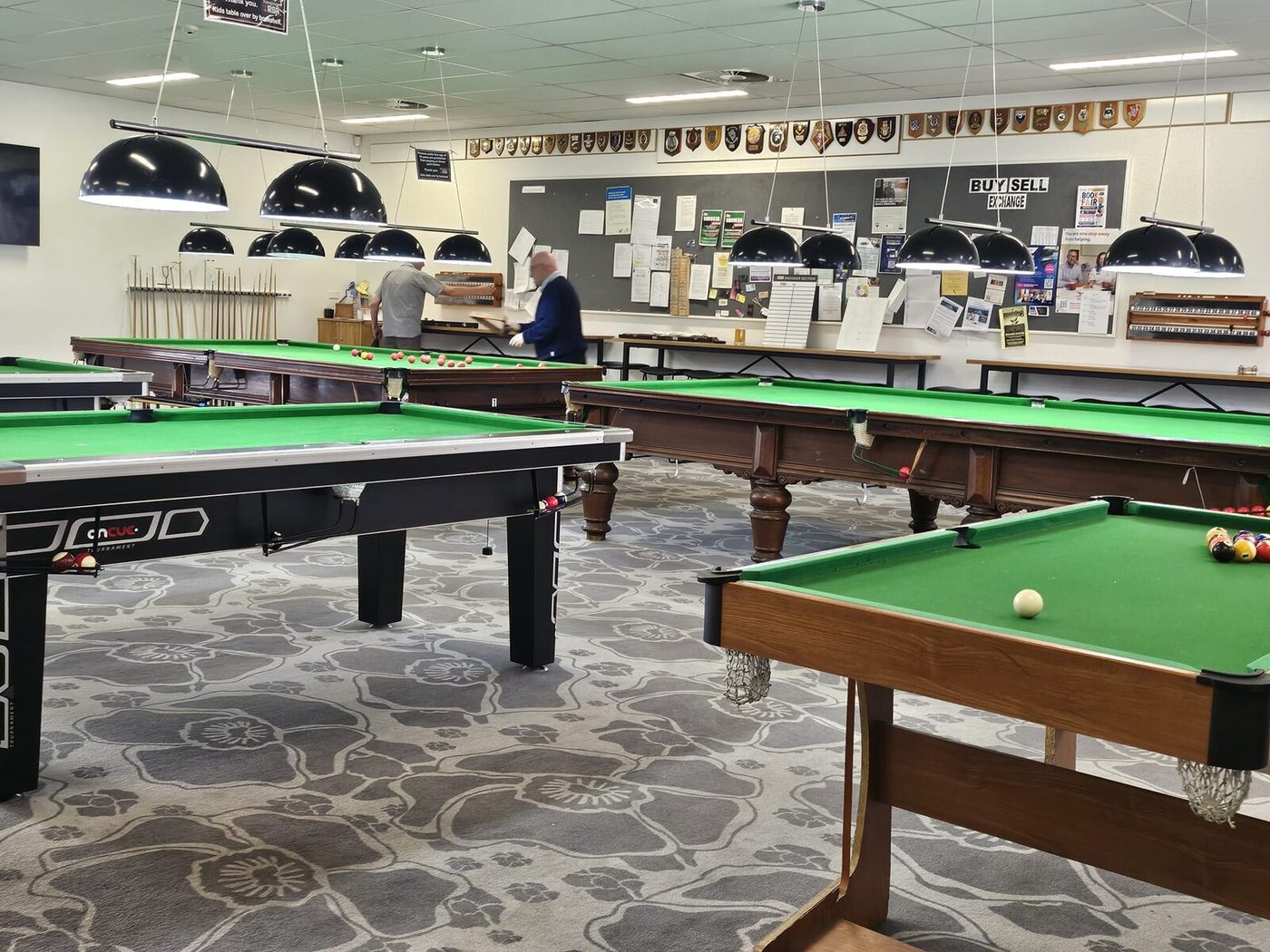 Pool tables in the club's games area